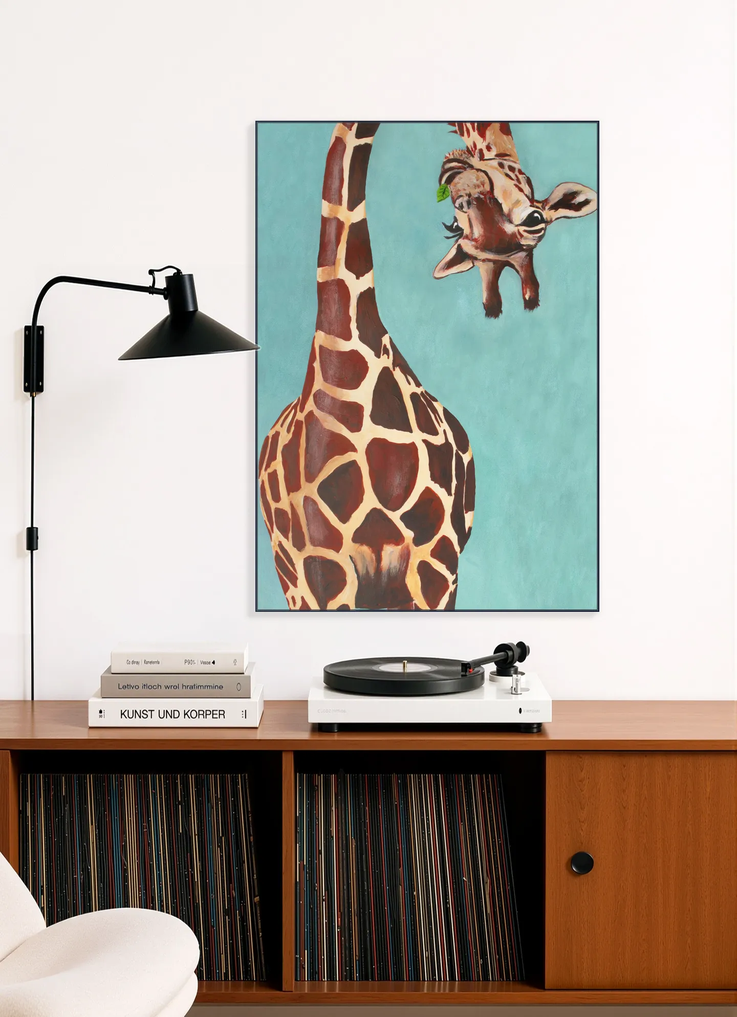 Giraffe with green leaf