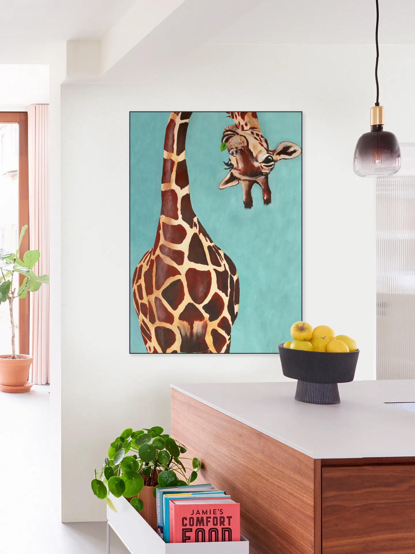 Giraffe with green leaf