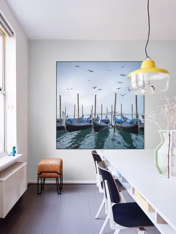 Gondolas at the pier with San Giorgio Maggiore island in the background, Venice, Italy