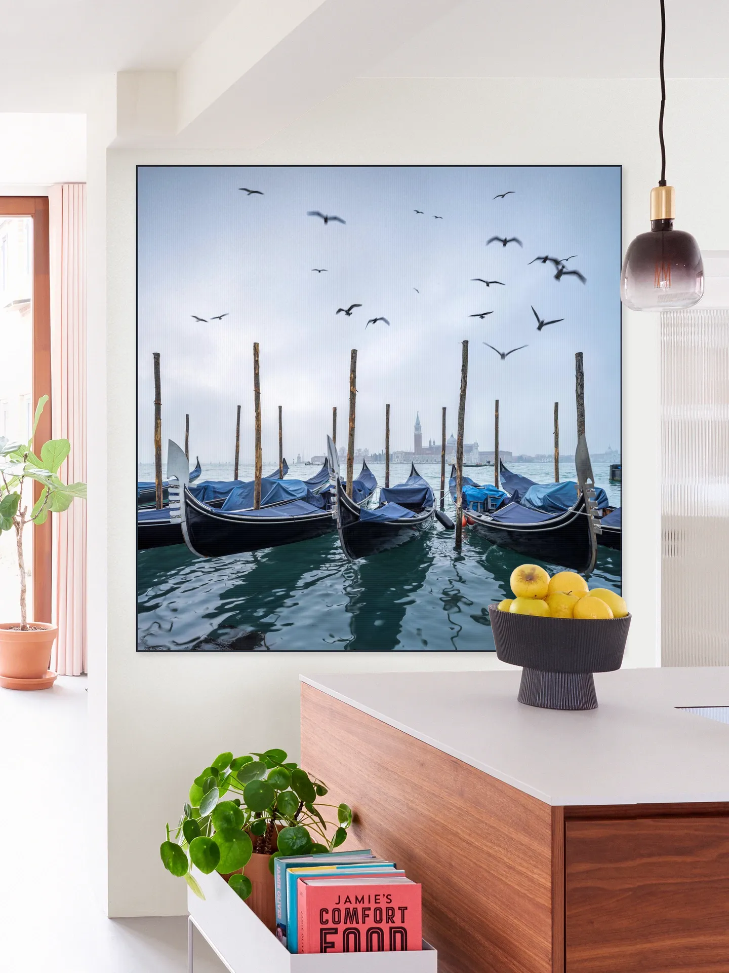 Gondolas at the pier with San Giorgio Maggiore island in the background, Venice, Italy
