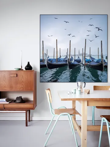 Gondolas at the pier with San Giorgio Maggiore island in the background, Venice, Italy