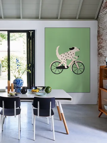 Spotted Dog Riding a Bicycle