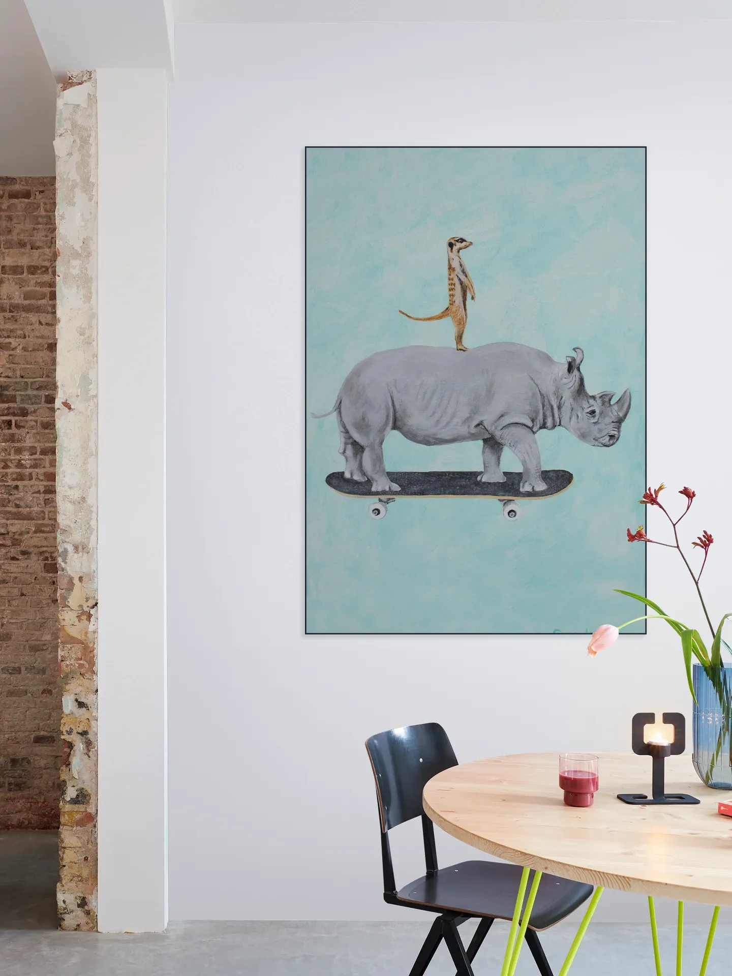 Rhinoceros and meerkat skateboarding