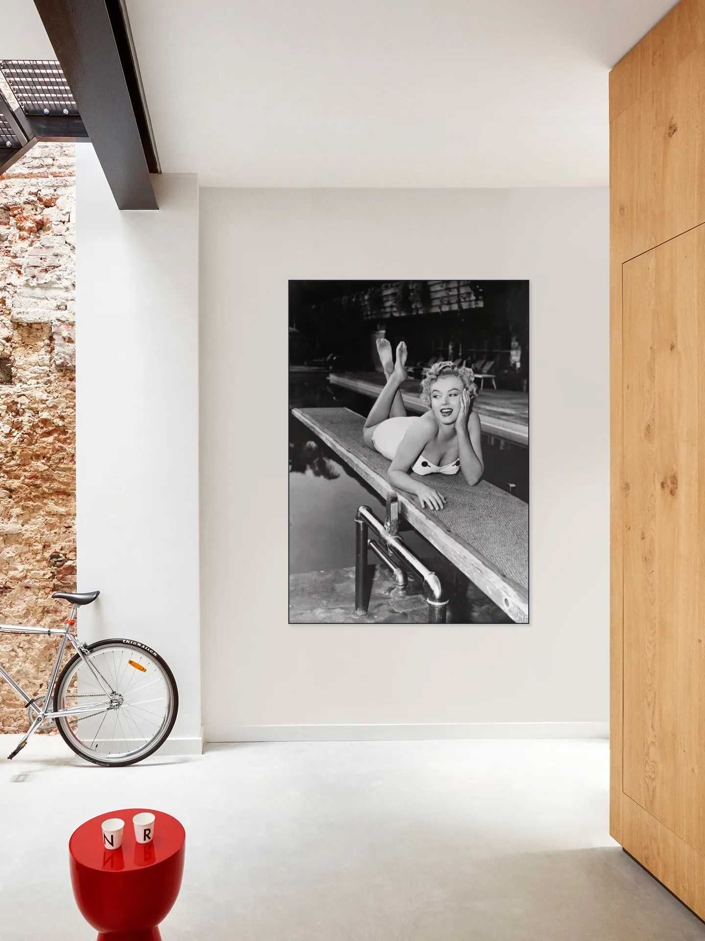 Marilyn Monroe lying on a springboard in California