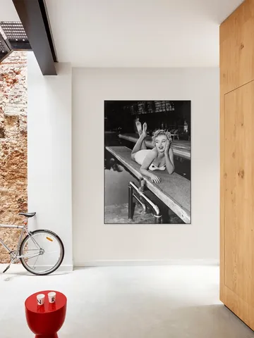 Marilyn Monroe lying on a springboard in California