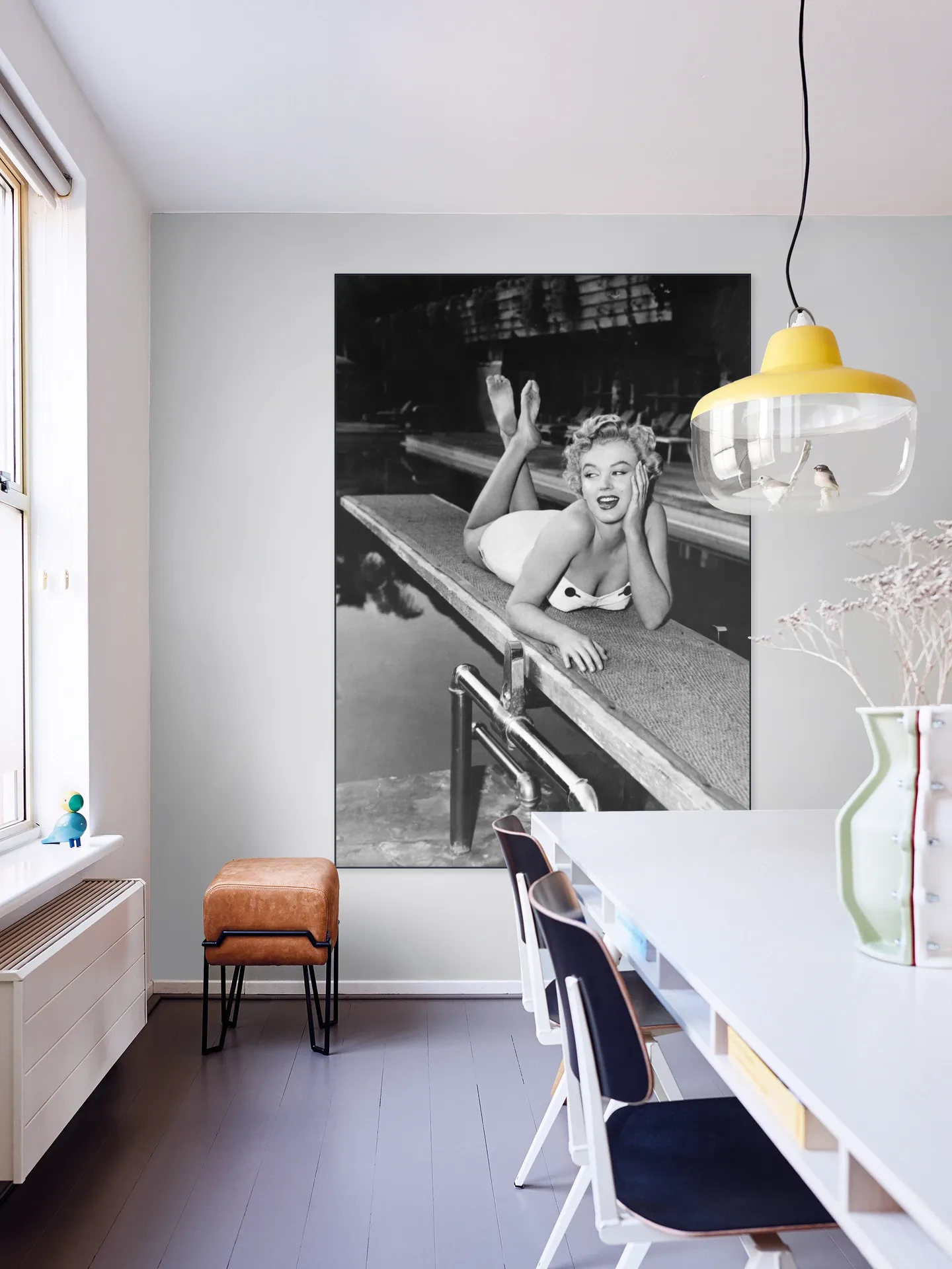 Marilyn Monroe lying on a springboard in California