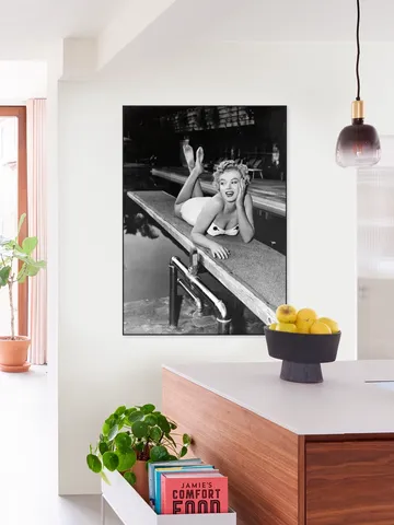 Marilyn Monroe lying on a springboard in California