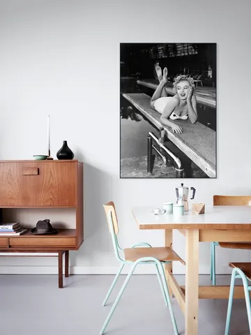 Marilyn Monroe lying on a springboard in California