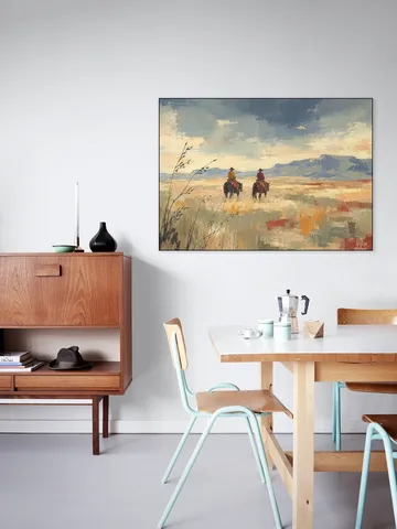 Cowboys on Horseback on a Vast Desert Plain