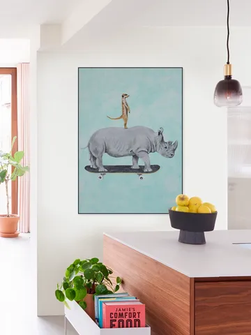 Rhinoceros and meerkat skateboarding