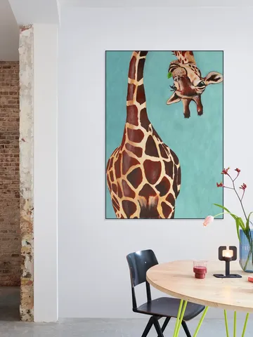 Giraffe with green leaf
